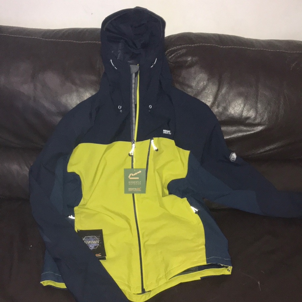 Size medium. Mens waterproof, breathable rain jacket
